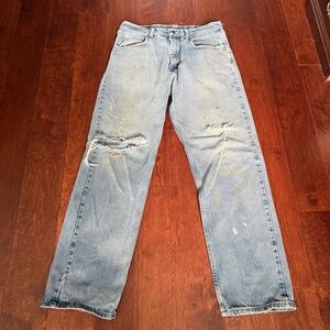 Vintage wrangler light washed distressed ripped blue Wrangler denim jeans 34x32